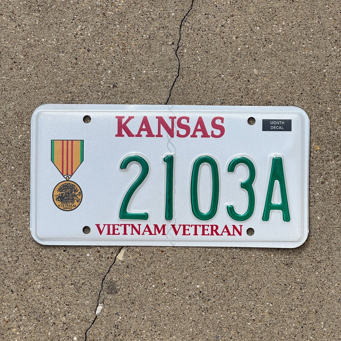 Photo of a 2012 Kansas Military License Plate Auto Tag Garage Decor Vintage Vietnam Veteran 2103 A