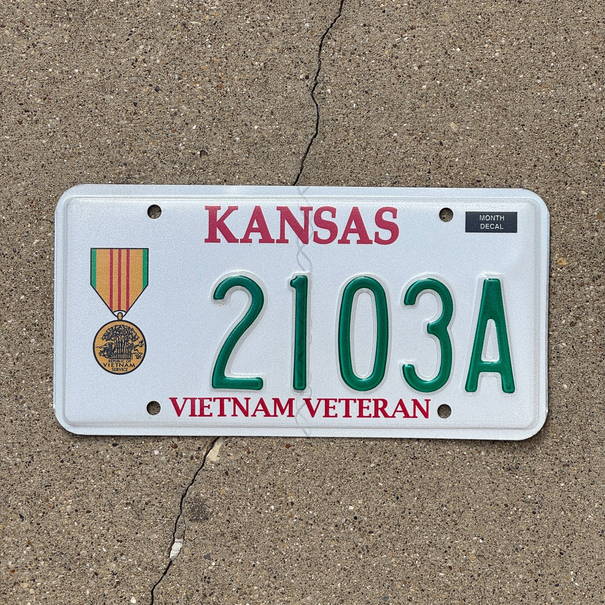 Photo of a 2012 Kansas Military License Plate Auto Tag Garage Decor Vintage Vietnam Veteran 2103 A