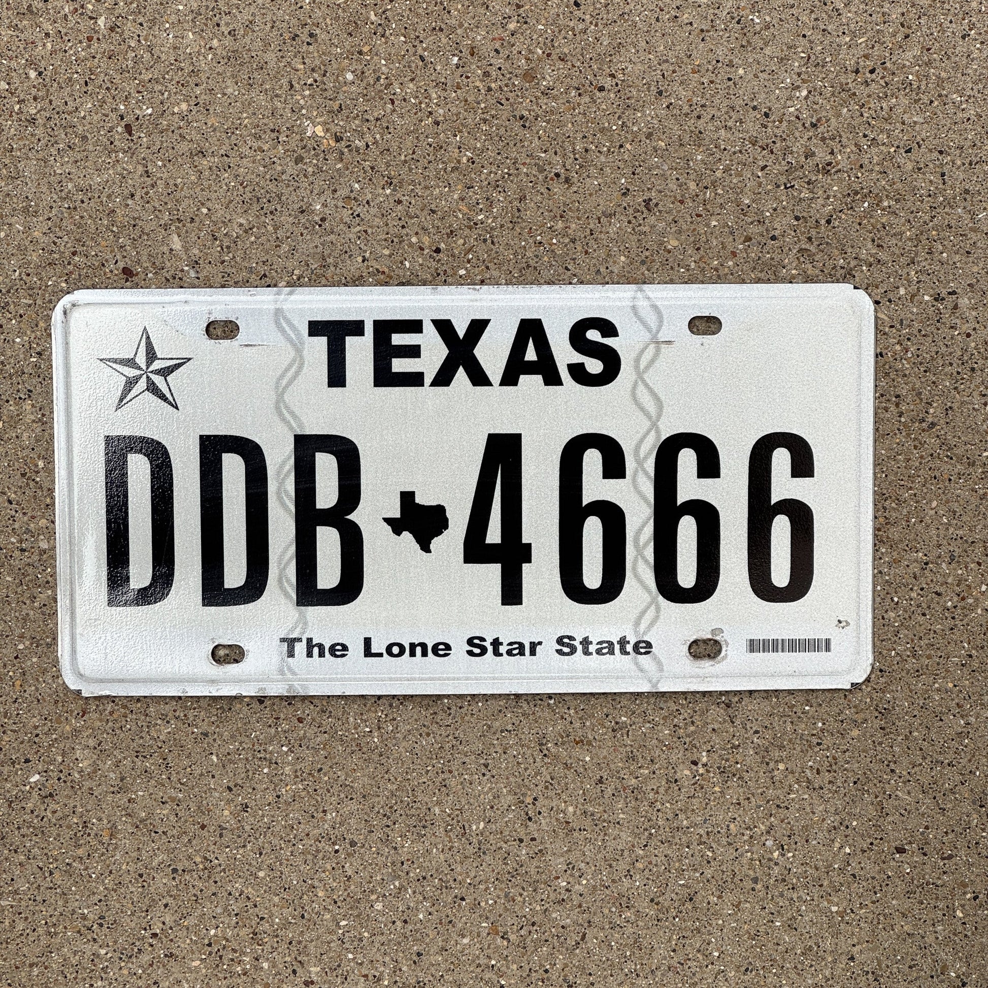 Photo of a 2012 Texas License Plate Auto Tag Garage Decor Vintage 666 Repeat Devil Evil DDB 4666