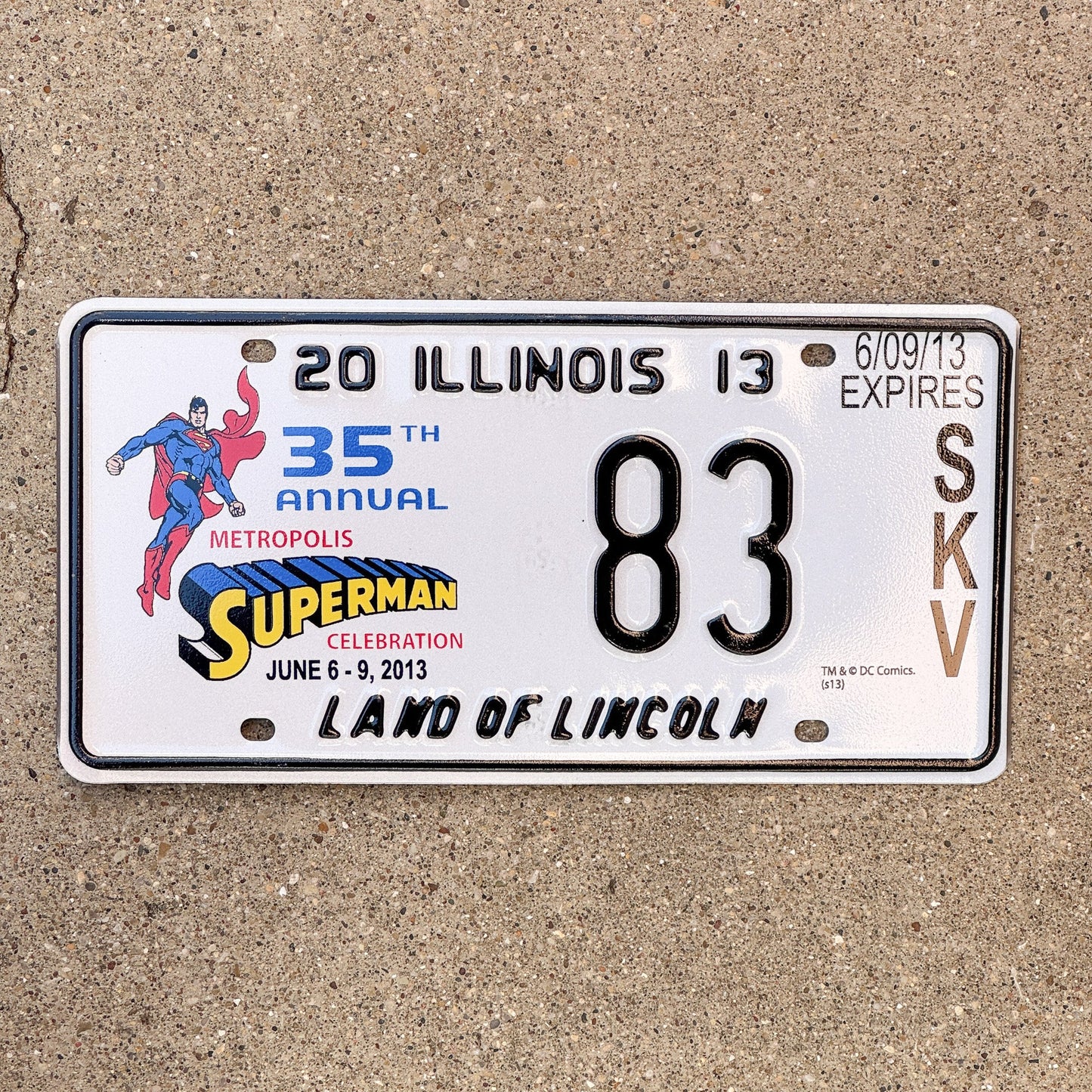 Photo of a 2013 Illinois Event License Plate Auto Tag 1 Garage Decor Metropolis Illinois Superman Comics 83 with original patina