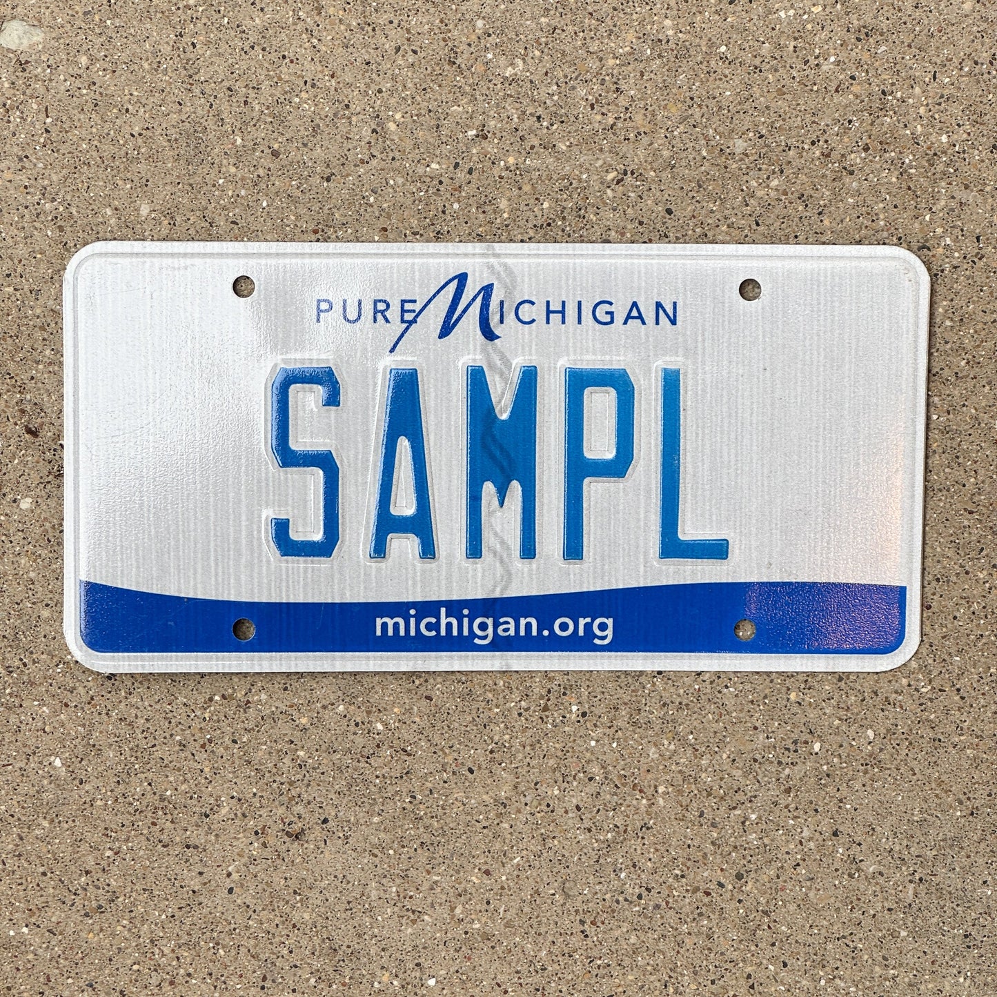 Photo of a 2013 Michigan Sample License Plate Auto Tag Garage Decor Vintage SAMPL