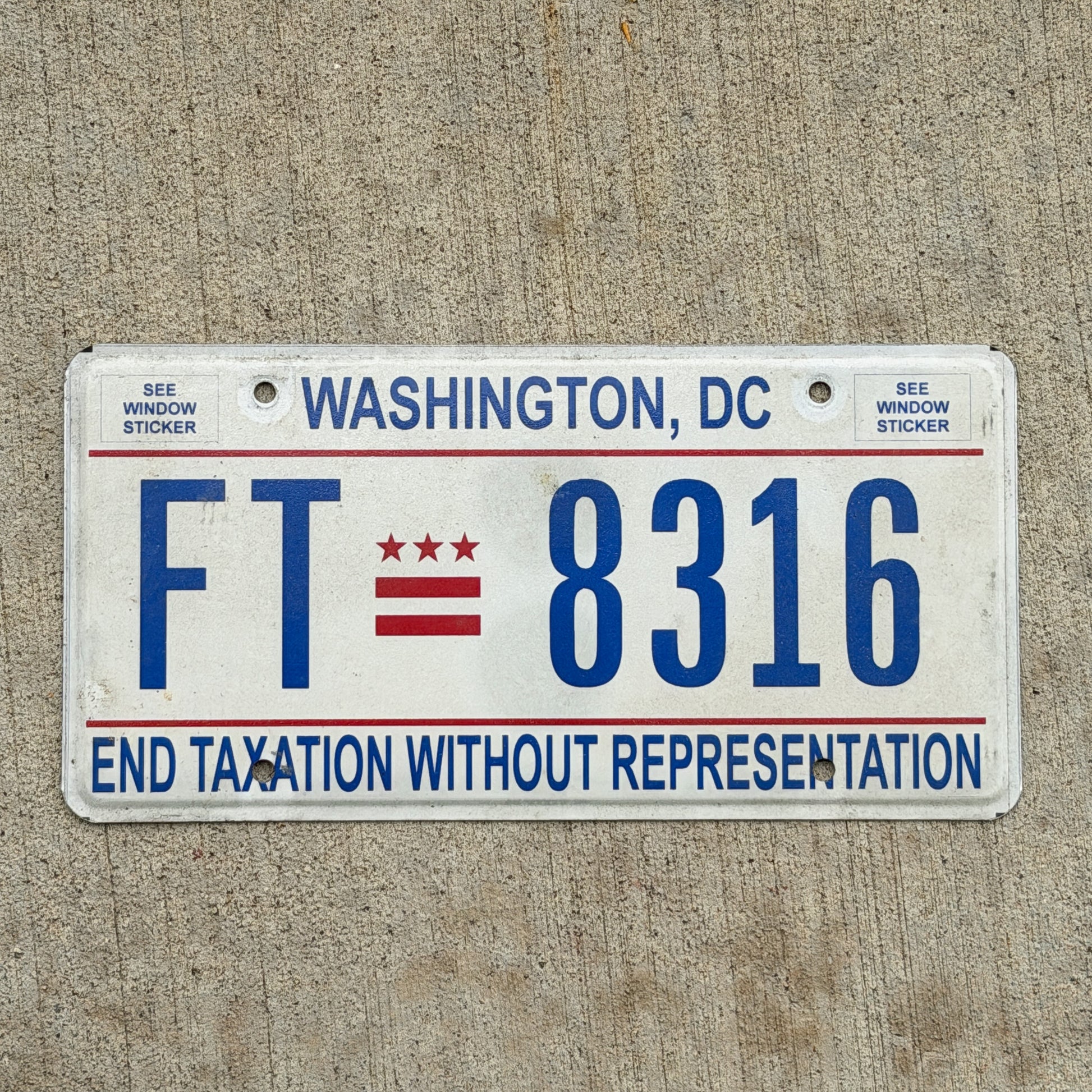 Photo of a 2013 Washington DC License Plate Auto Tag 1 Vintage Garage End Taxation Without Representation FT 8316 with original patina