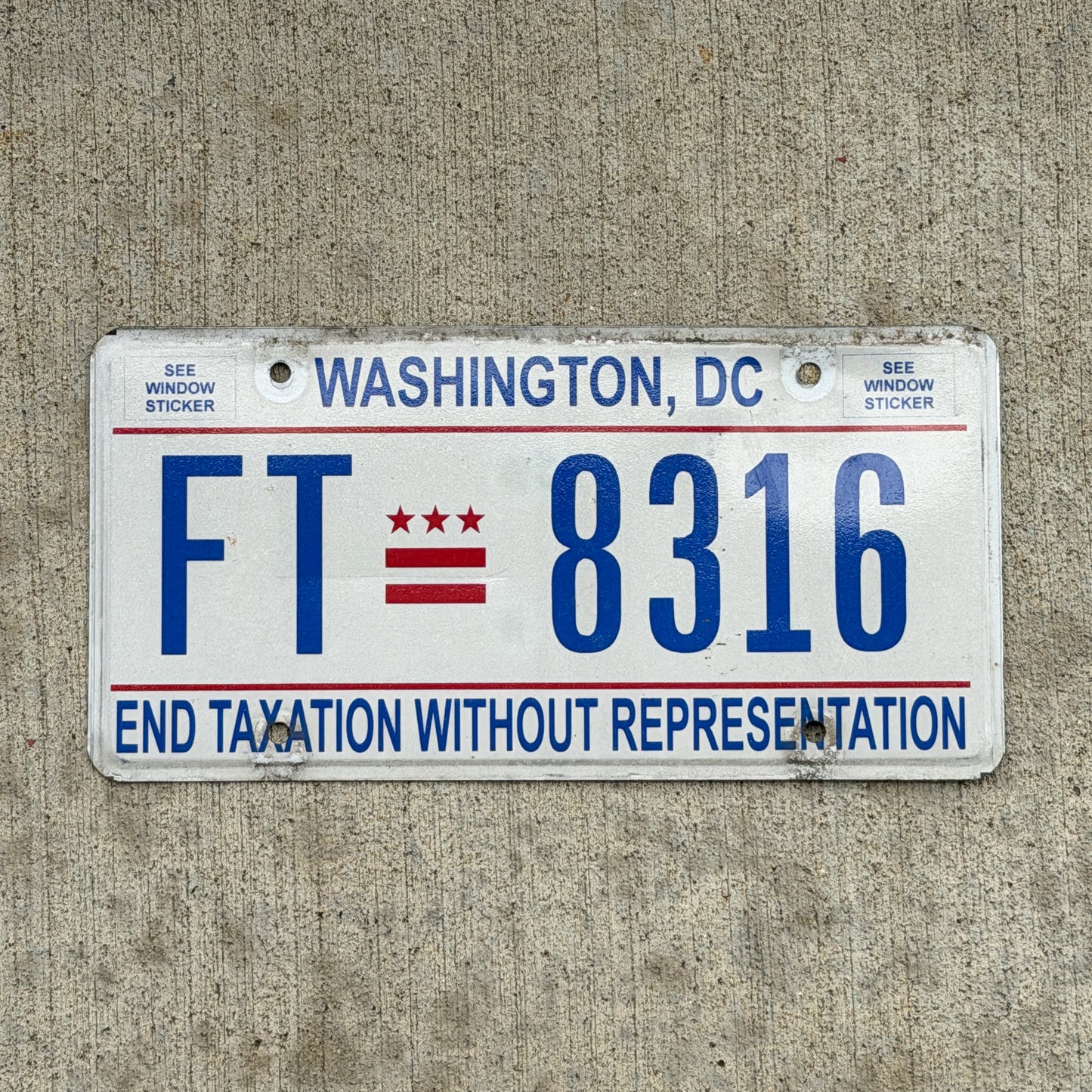 Photo of a 2013 Washington DC License Plate Auto Tag 2 Vintage Garage End Taxation Without Representation FT 8316 with original patina