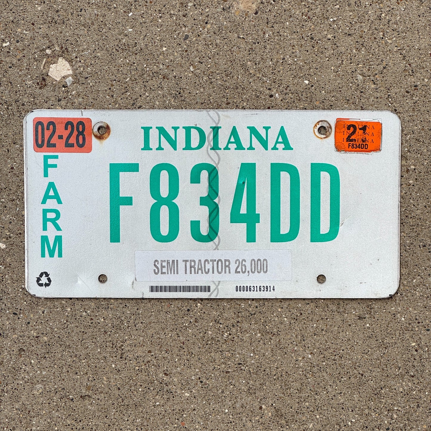 Photo of a 2014 2021 Indiana Farm Semi Tractor License Plate Auto Tag Garage Decor Vintage F 834 DD with original patina