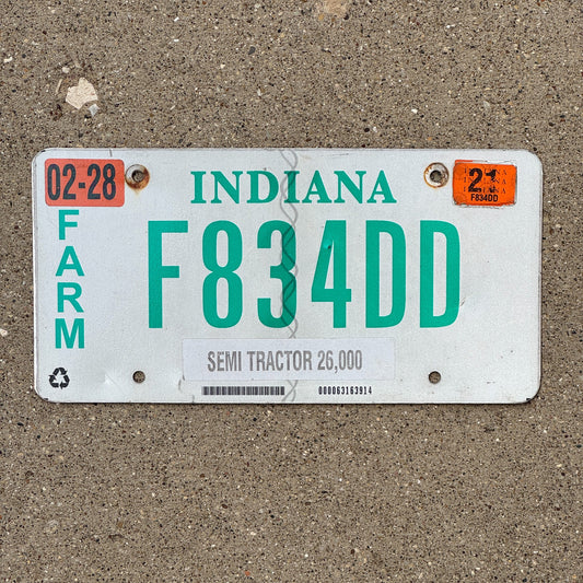 Photo of a 2014 2021 Indiana Farm Semi Tractor License Plate Auto Tag Garage Decor Vintage F 834 DD with original patina