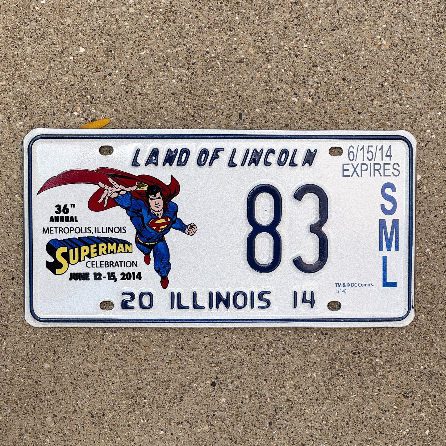Photo of a 2014 Illinois Event License Plate Auto Tag 1 Garage Decor Metropolis Illinois Superman Comics 83 with original patina