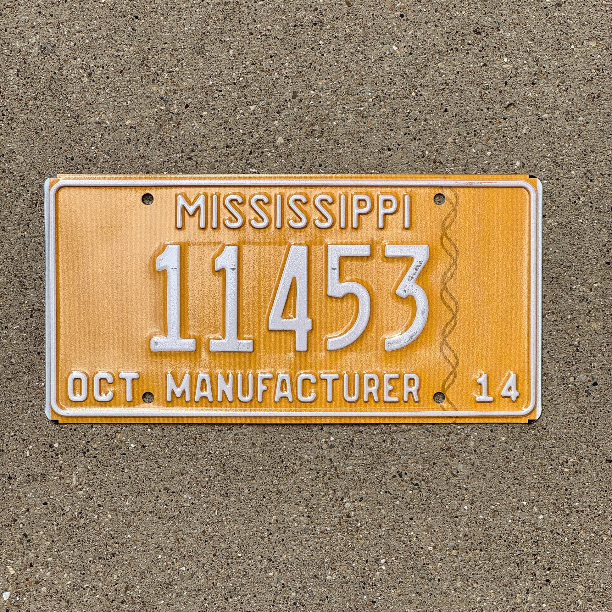 Photo of a 2014 Mississippi Manufacturer License Plate Auto Tag Garage Decor Vintage 11453