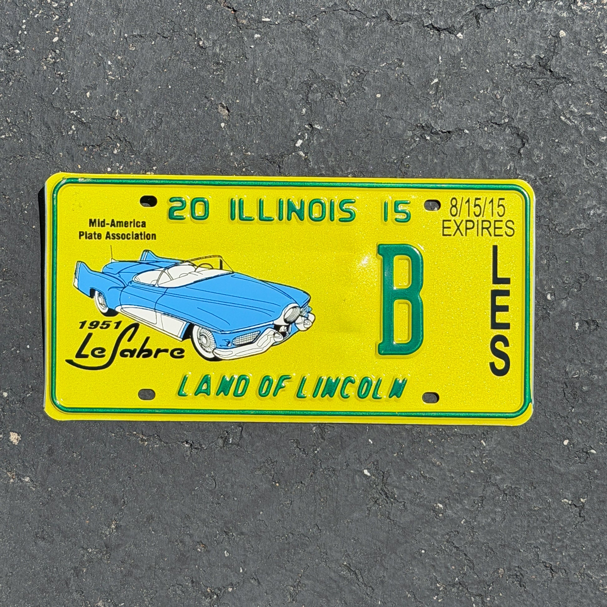 Photo of a 2015 2015 Illinois Event License Plate Auto Tag Garage Decor Vintage MAPA Buick LeSabre B with original patina