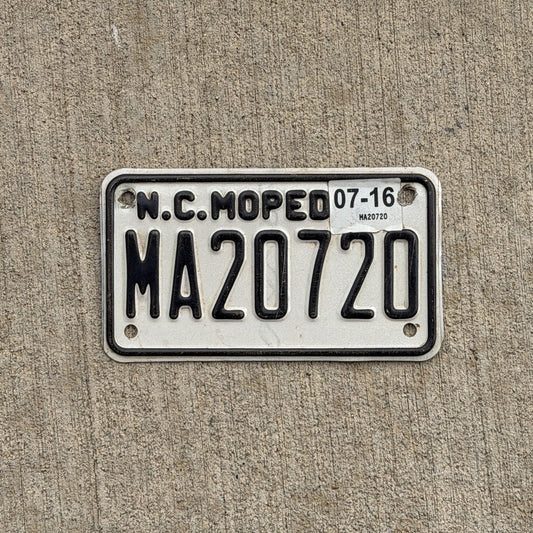 Photo of a 2015 2016 North Carolina Moped License Plate Auto Tag Garage Decor Vintage MA 20720 with original patina