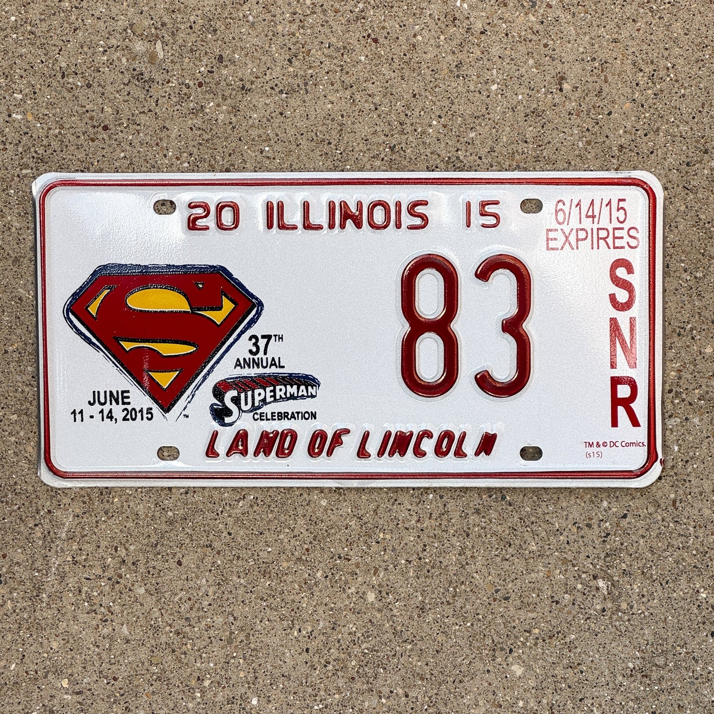 Photo of a 2015 Illinois Event License Plate Auto Tag 2 Garage Decor Metropolis Illinois Superman Comics 83 with original patina