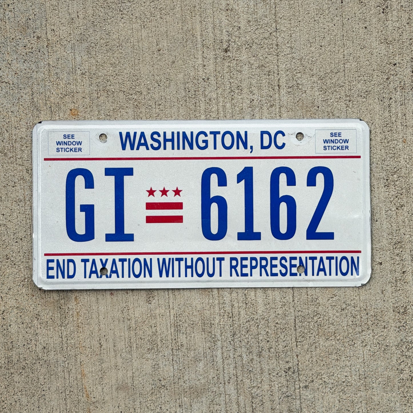 Photo of a 2017 Washington DC License Plate Auto Tag 2 Vintage Garage End Taxation Without Representation GI 6162 with original patina
