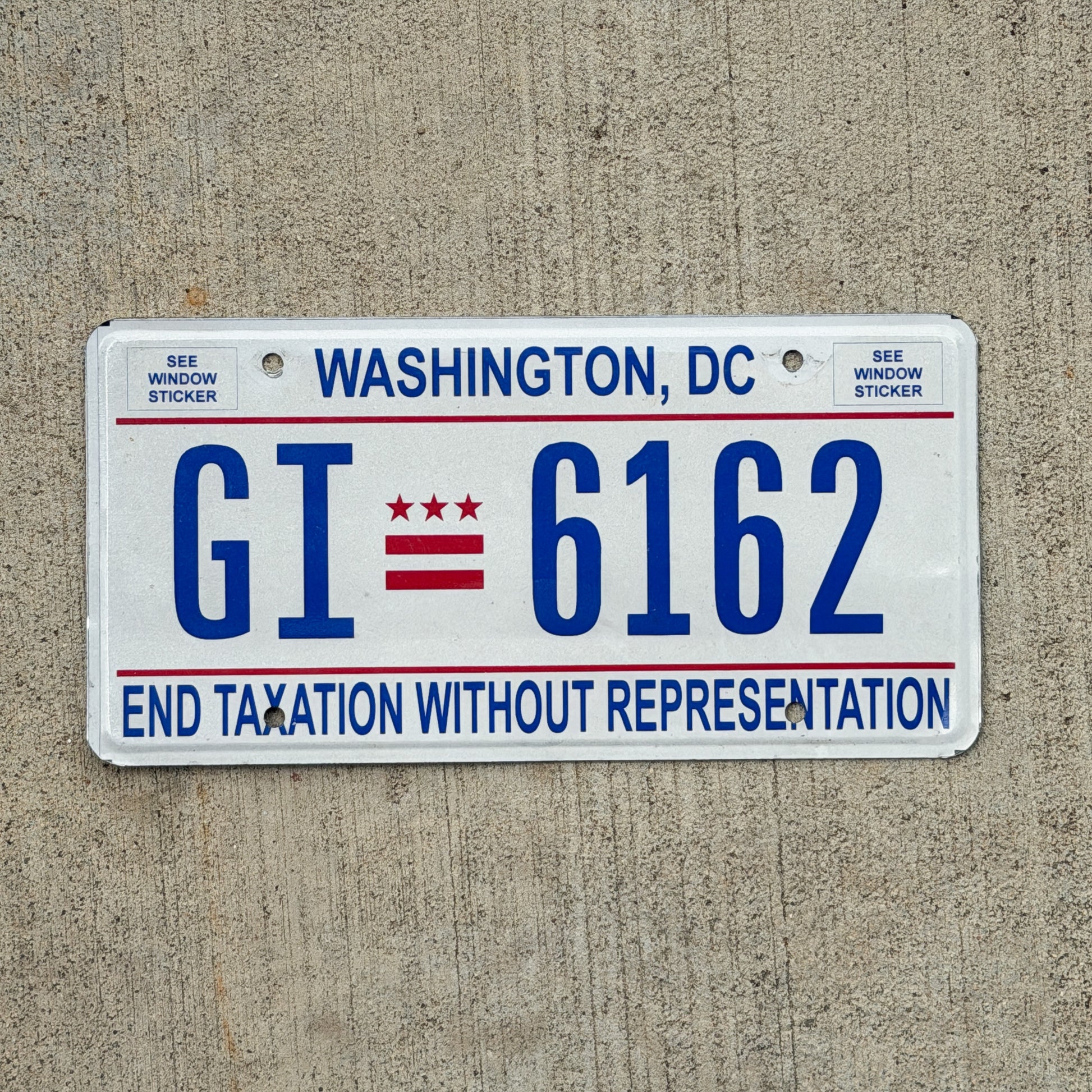 Photo of a 2017 Washington DC License Plate Auto Tag 2 Vintage Garage End Taxation Without Representation GI 6162 with original patina