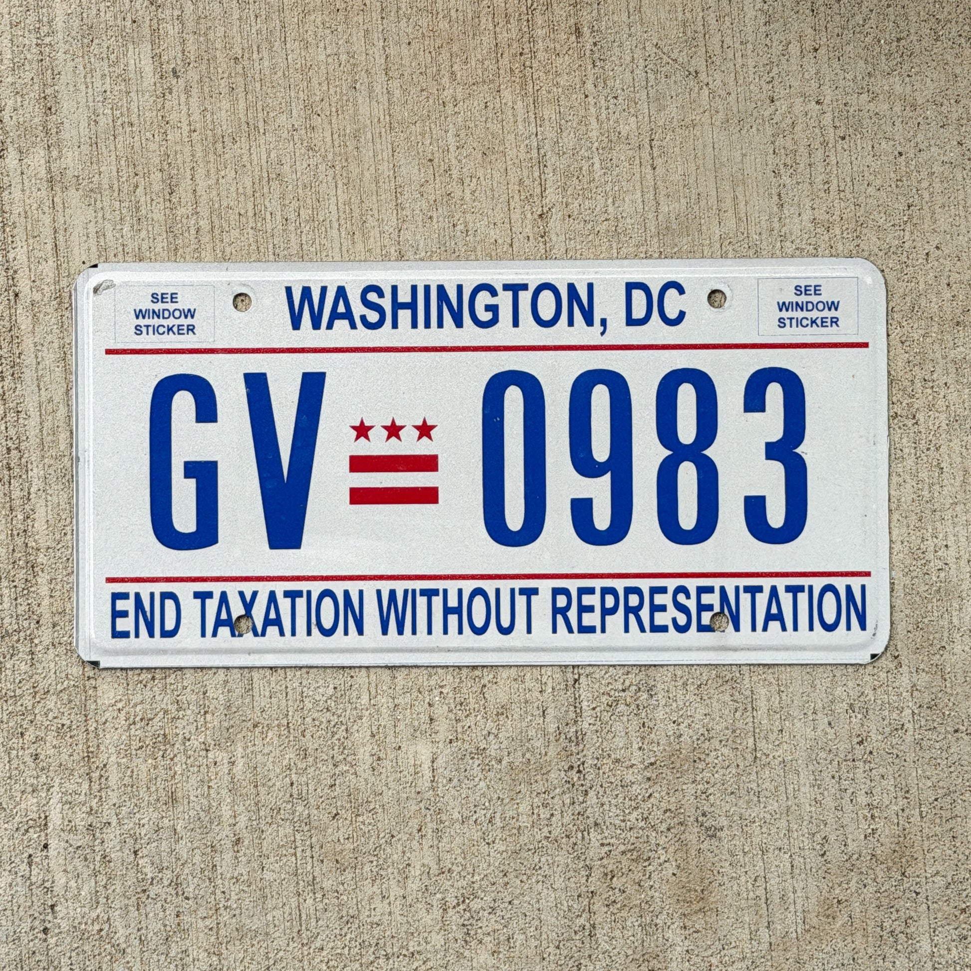 Photo of a 2017 Washington DC License Plate Auto Tag 2 Vintage Garage End Taxation Without Representation GV 0983 with original patina