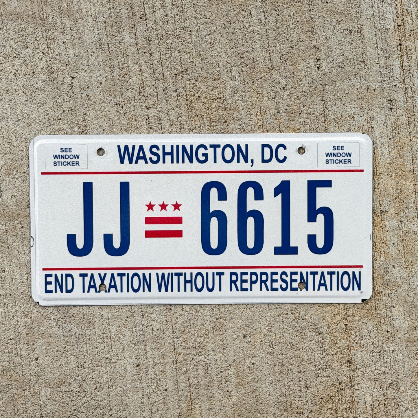 Photo of a 2017 Washington DC License Plate Auto Tag 2 Vintage Garage End Taxation Without Representation JJ 6615 with original patina
