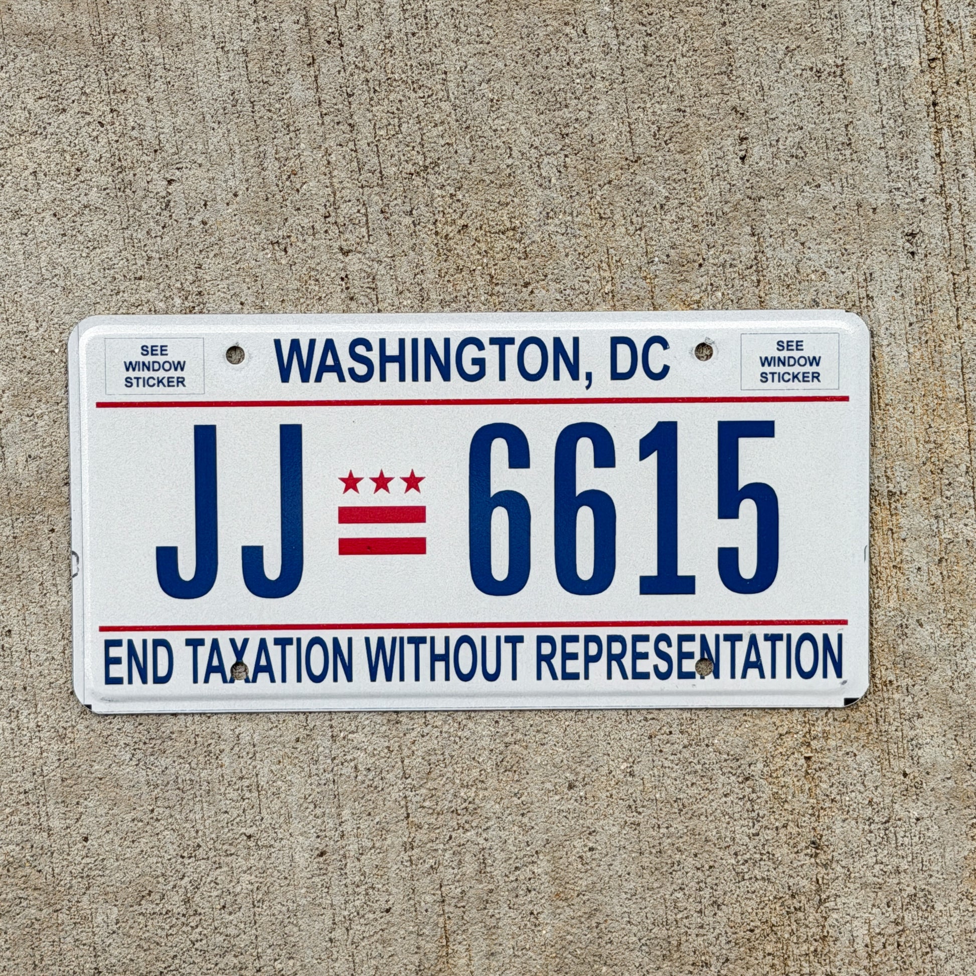 Photo of a 2017 Washington DC License Plate Auto Tag 2 Vintage Garage End Taxation Without Representation JJ 6615 with original patina