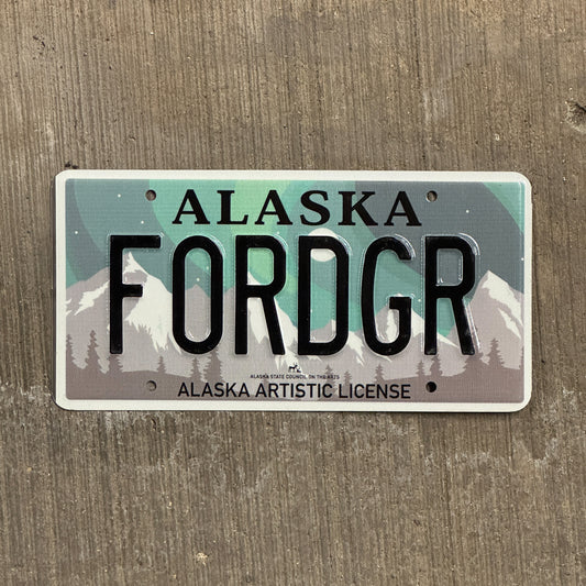Photo of a 2019 Alaska Graphic Vanity License Plate Auto Tag 2 Vintage Garage Artistic Northern Lights Ford GR Forger FORDGR with original patina