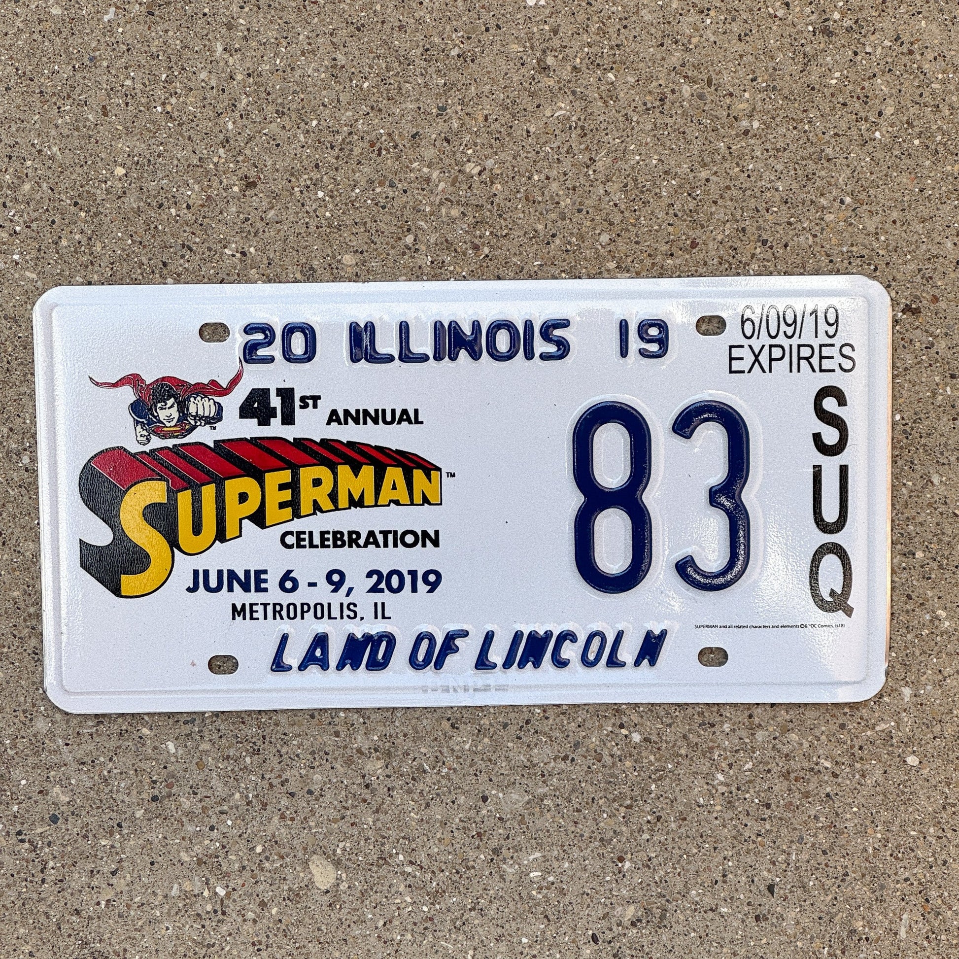 Photo of a 2019 Illinois Event License Plate Auto Tag 1 Garage Decor Metropolis Illinois Superman Comics 83 with original patina