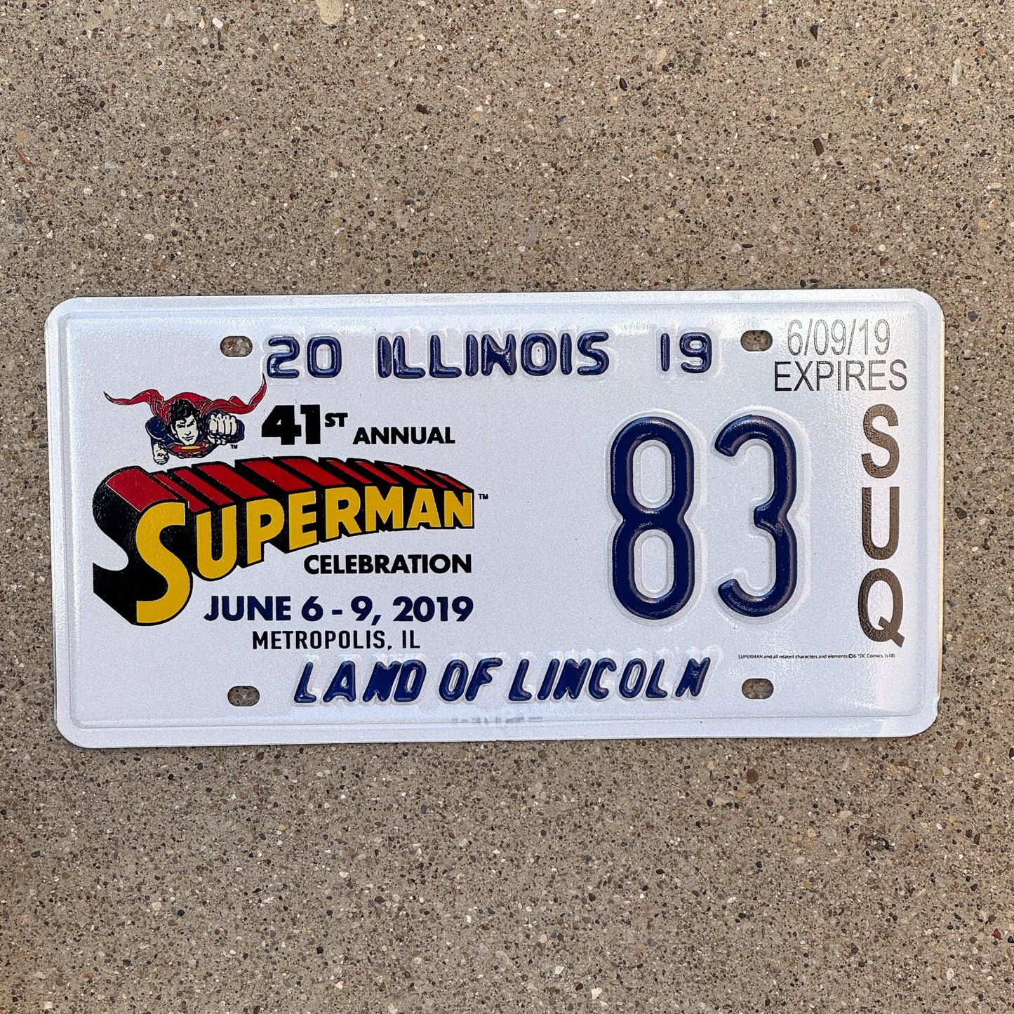 Photo of a 2019 Illinois Event License Plate Auto Tag 2 Garage Decor Metropolis Illinois Superman Comics 83 with original patina