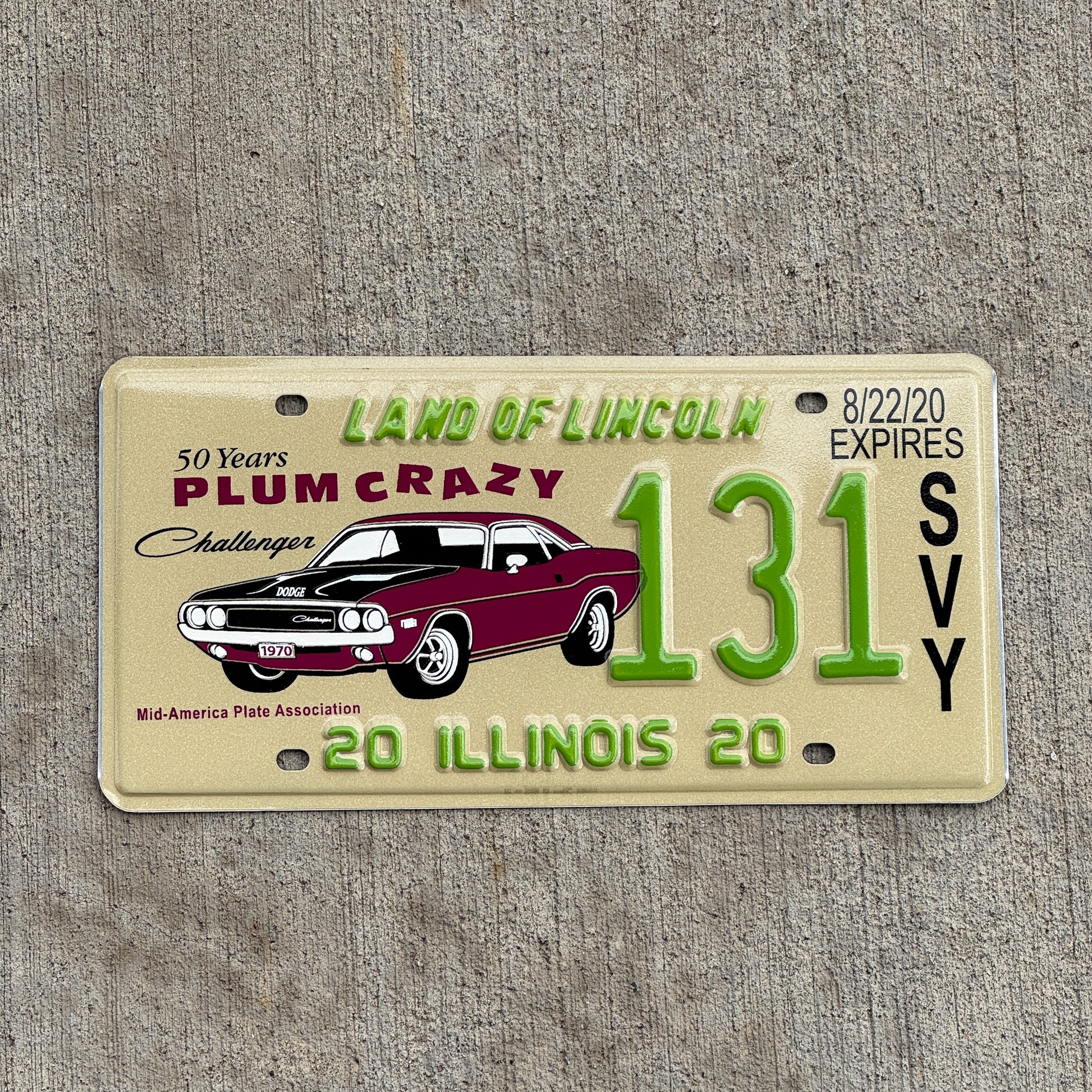 Photo of a 2020 Illinois Event License Plate Auto Tag Garage Decor Vintage Dodge Challenger Plum Crazy MAPA 131 with original patina