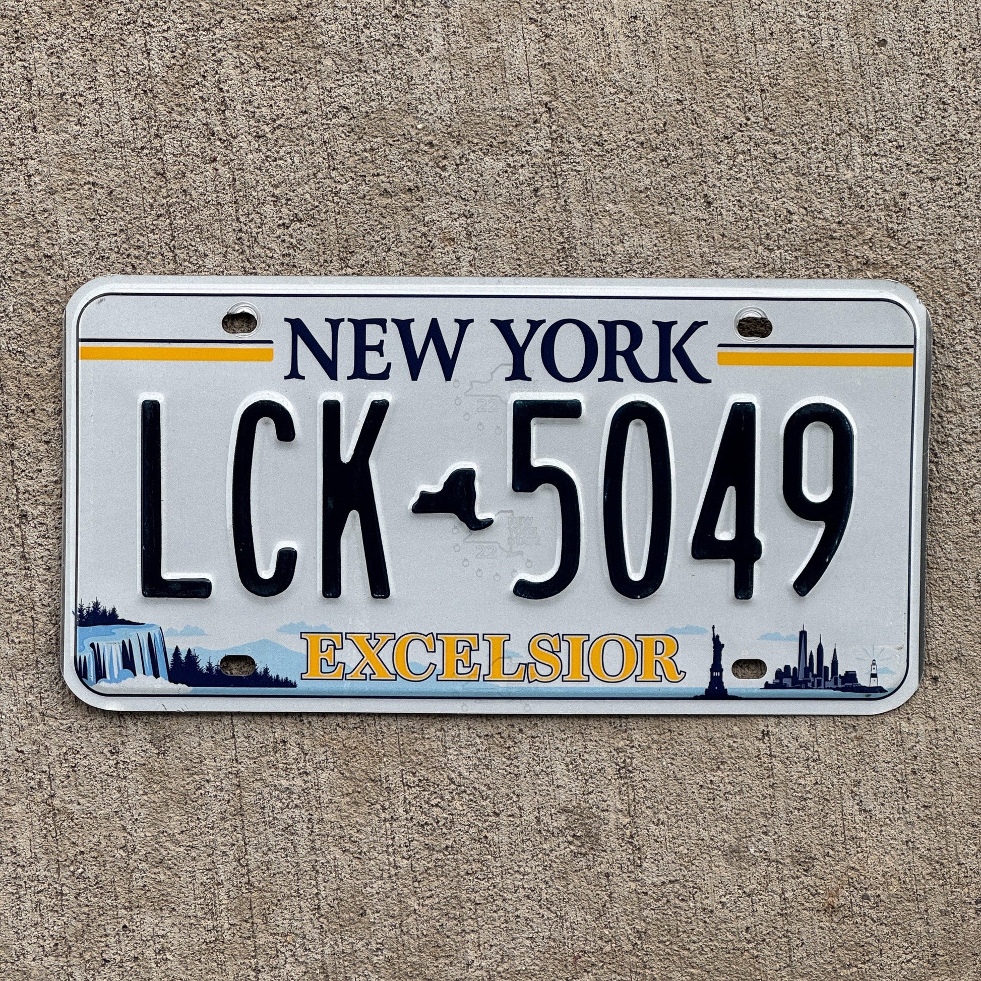Photo of a 2020 New York License Plate Auto Tag Garage Decor Vintage Excelsior LCK 5049