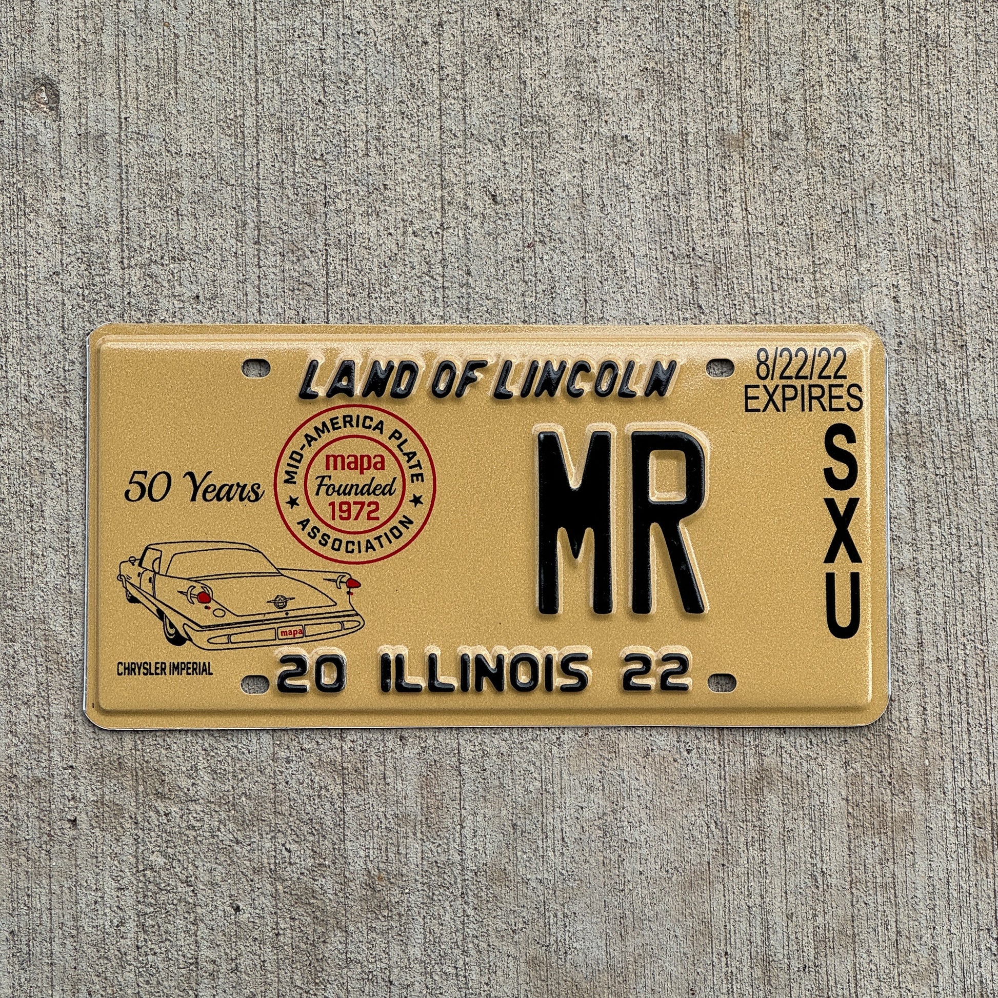 Photo of a 2022 Illinois Event License Plate Auto Tag Garage Decor Vintage 1072 Chrysler Imperial MR with original patina