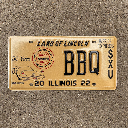 Photo of a 2022 Illinois EVENT License Plate Auto Tag Garage Decor Vintage Chrysler Imperial BBQ