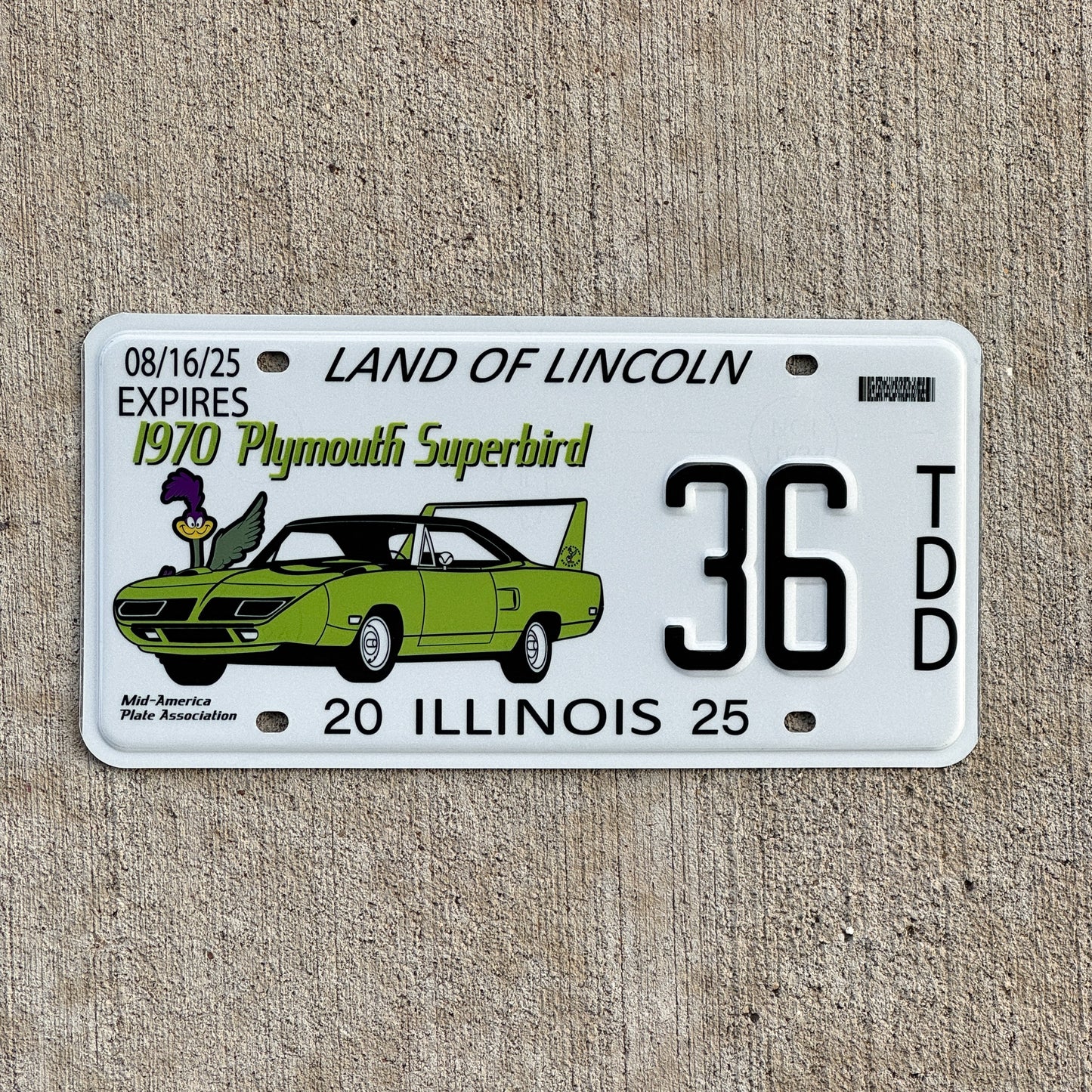 Photo of a 2025 Illinois Event License Plate Auto Tag Garage Decor Vintage Plymouth Superbird MAPA 36 with original patina