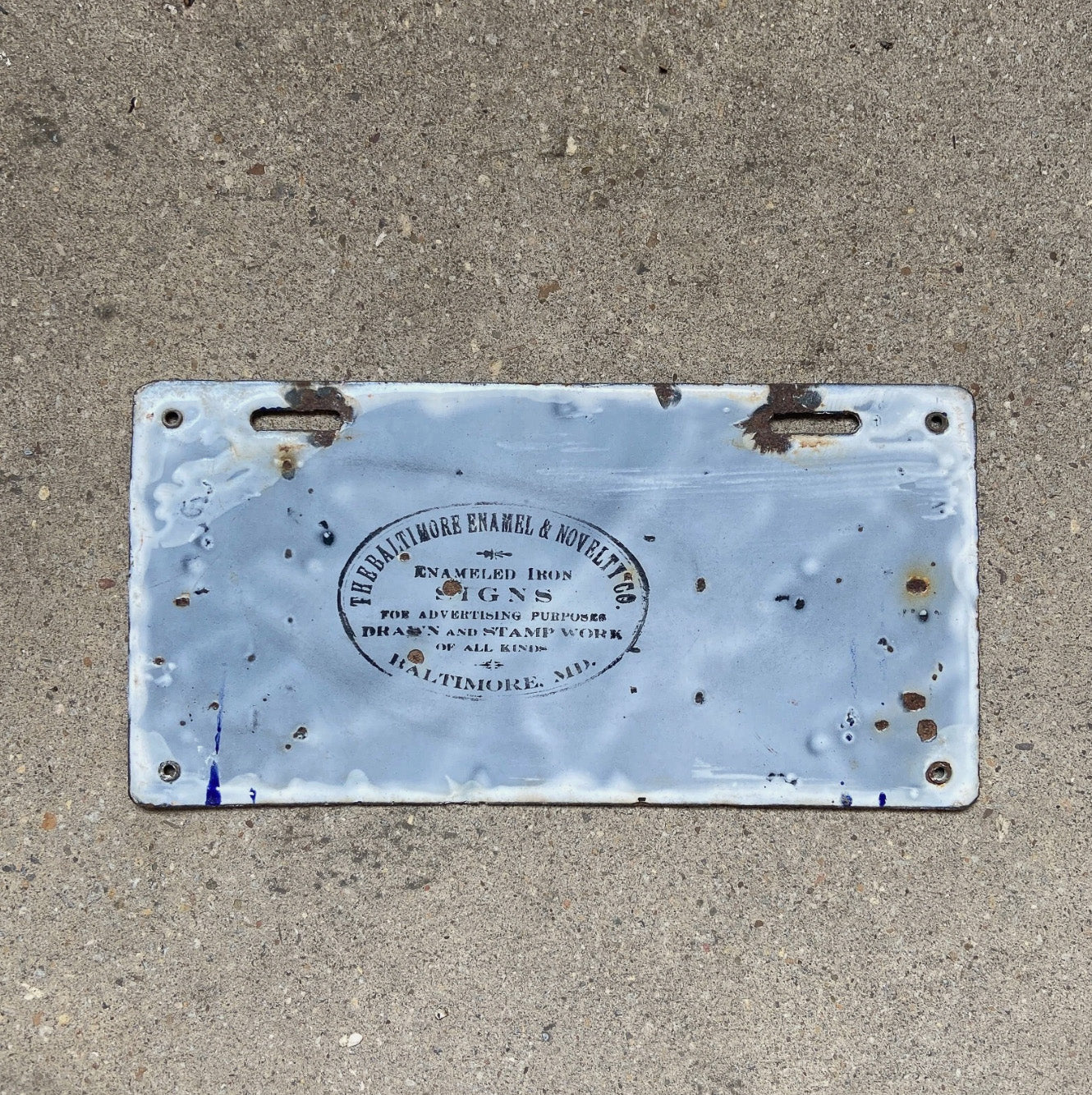 A detail view (back side) of the 1915 Delaware porcelain license plate.