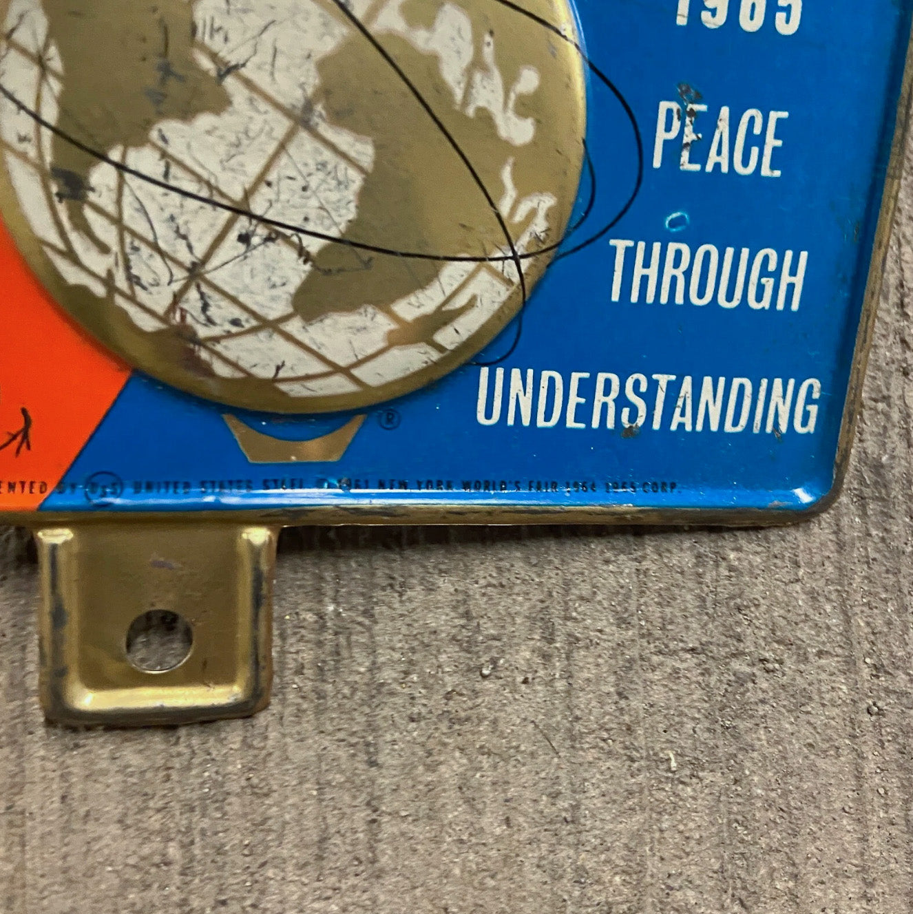 1964 New York World's Fair License Plate Topper Vintage Auto Tag Unisphere
