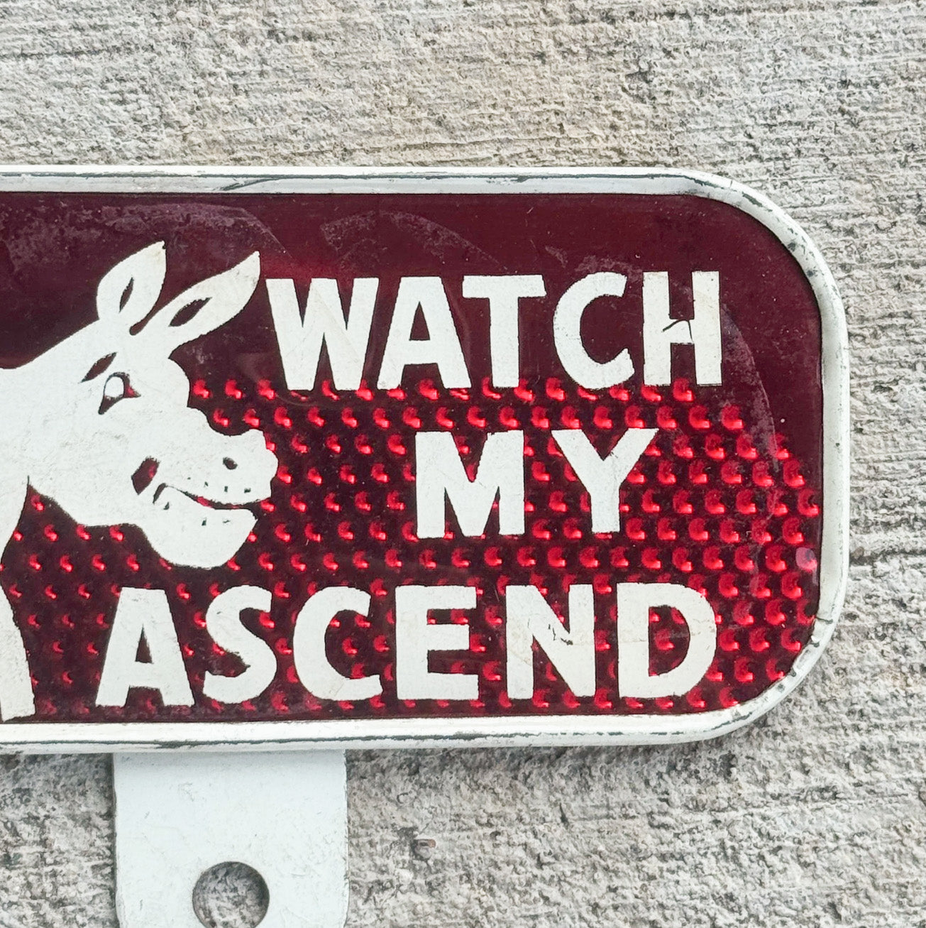 1960 Era Watch My Ascend License Plate Topper Auto Tag Red Reflective Donkey Pun Snow Craggs