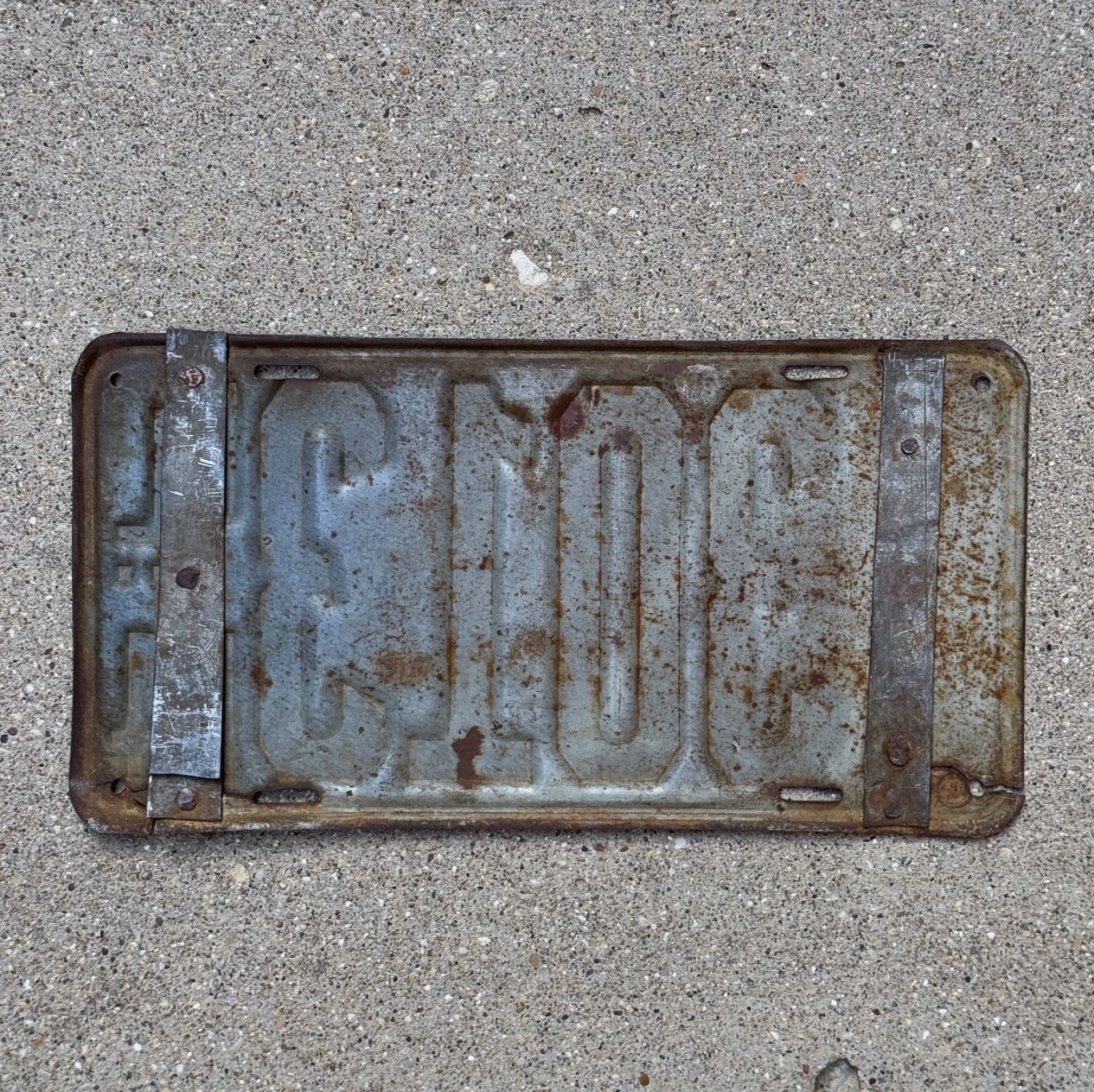 Photo of the reverse side of a 1914 Illinois License Plate Auto Tag Garage Decor Vintage Low Number Four Digit 3013 with original patina