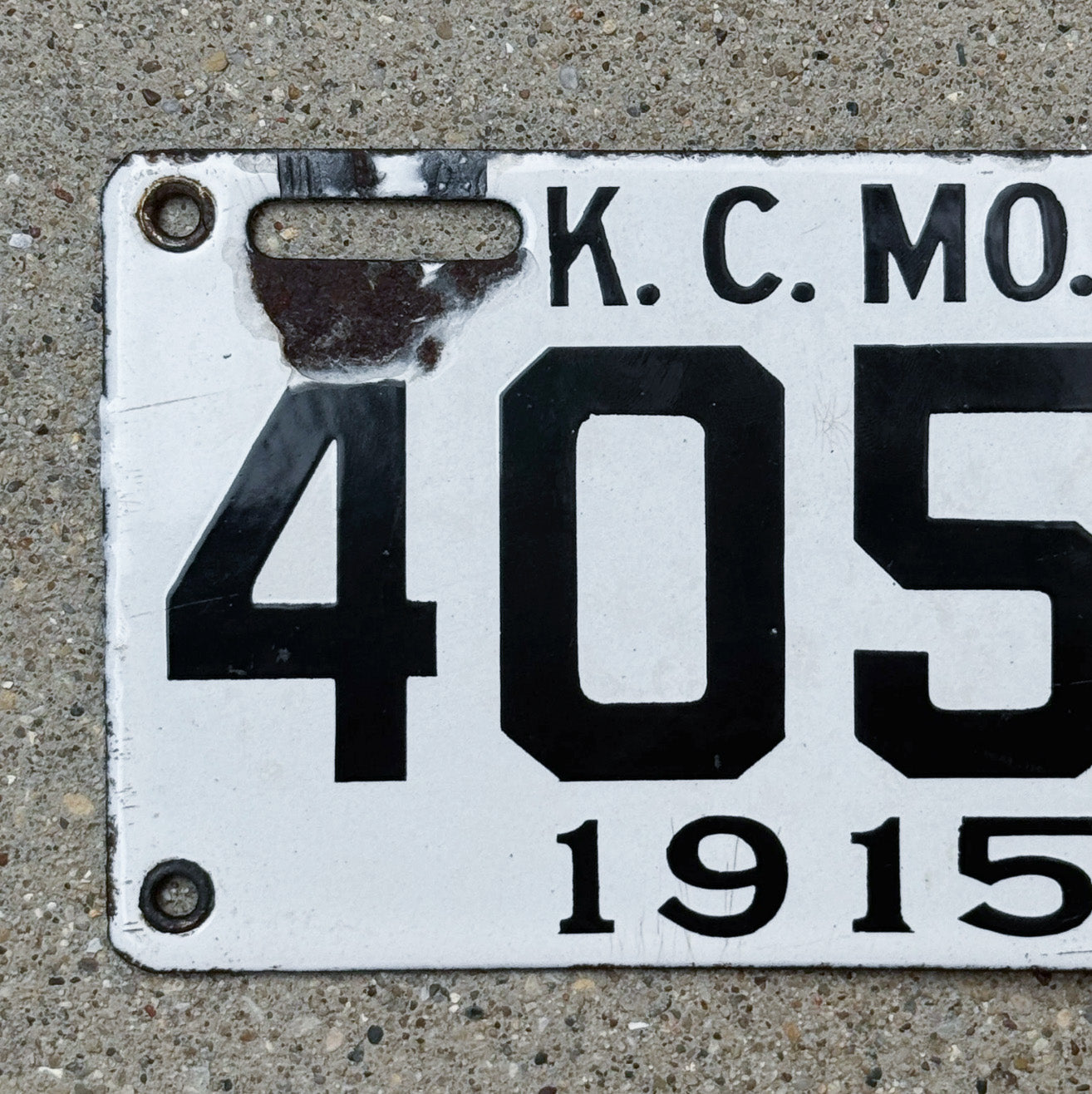 1915 Kansas City Missouri Porcelain License Plate Auto Tag 4050