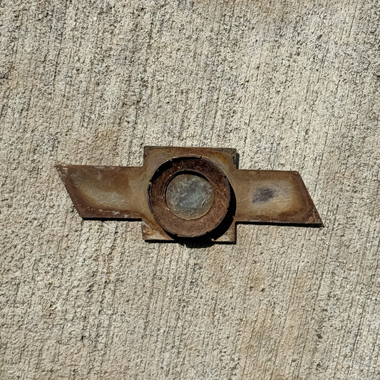 Reverse side of a Chevy Bowtie Porcelain Badge Emblem License Plate Topper Auto Tag Chevrolet - Larger Size