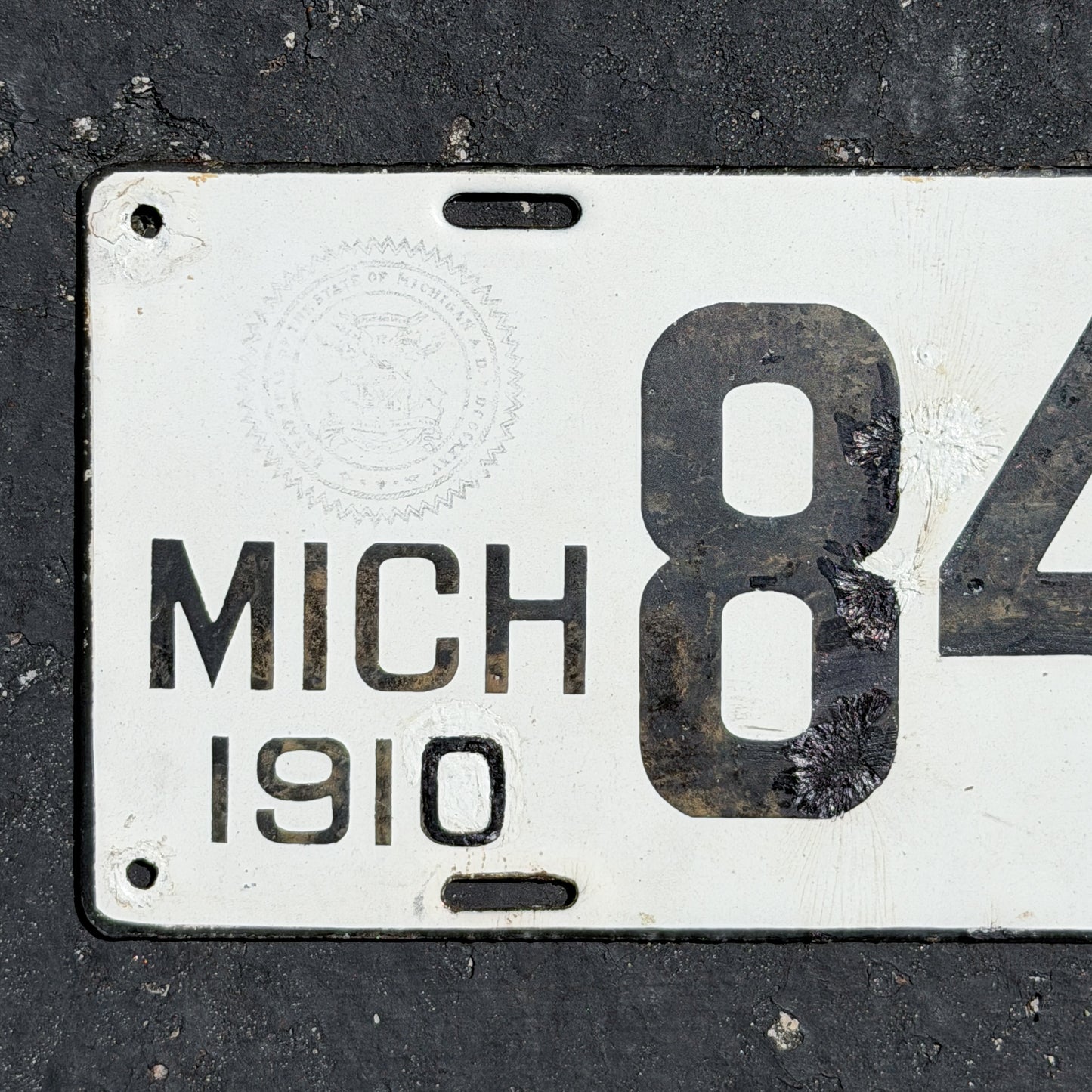 1910 Michigan Porcelain License Plate Auto Tag Low Number Four Digit 8476