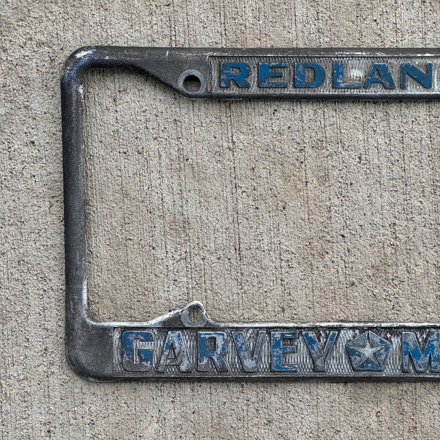 1970 Era Redlands California License Plate Frame Auto Tag Garvey Motors Chrysler and Plymouth