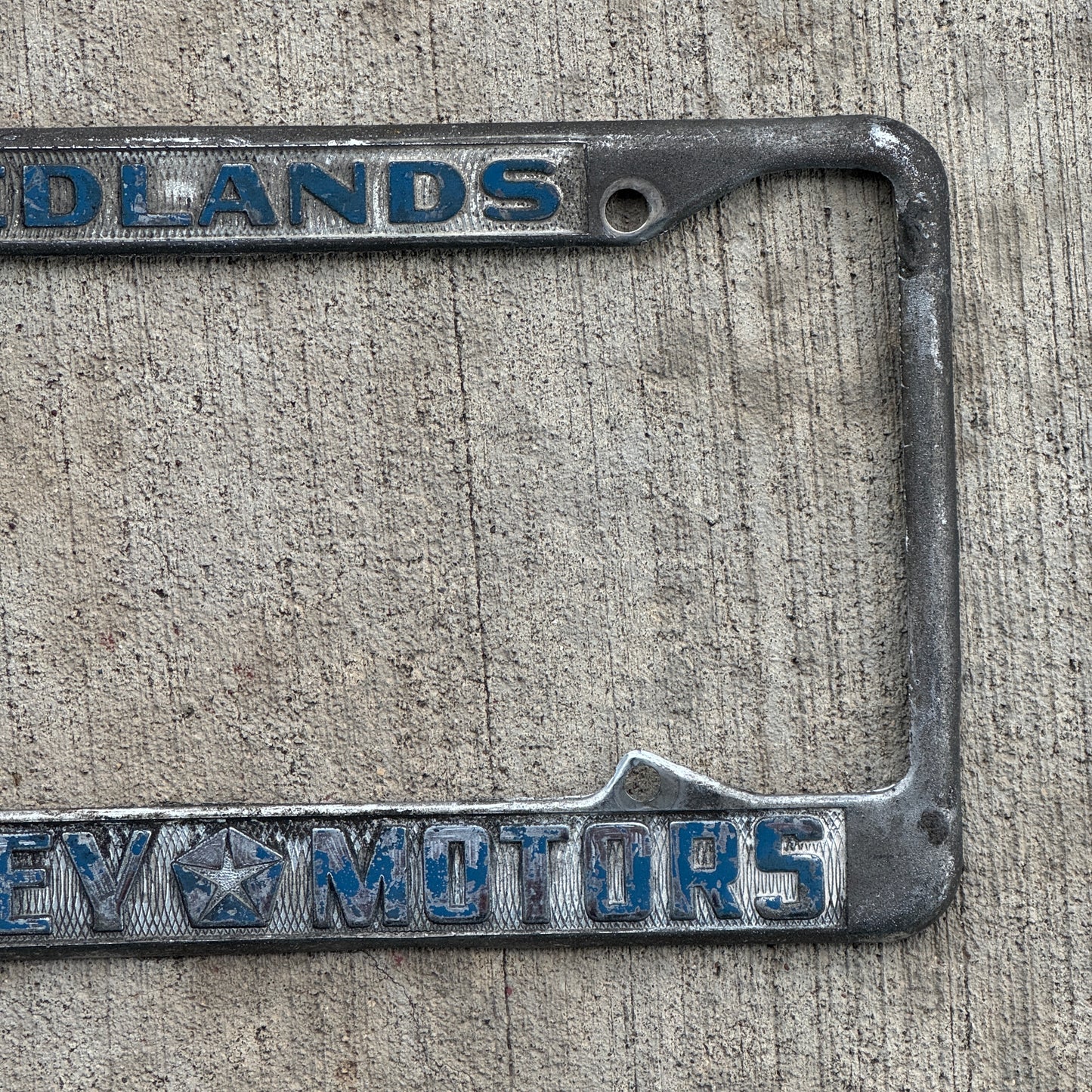 1970 Era Redlands California License Plate Frame Auto Tag Garvey Motors Chrysler and Plymouth