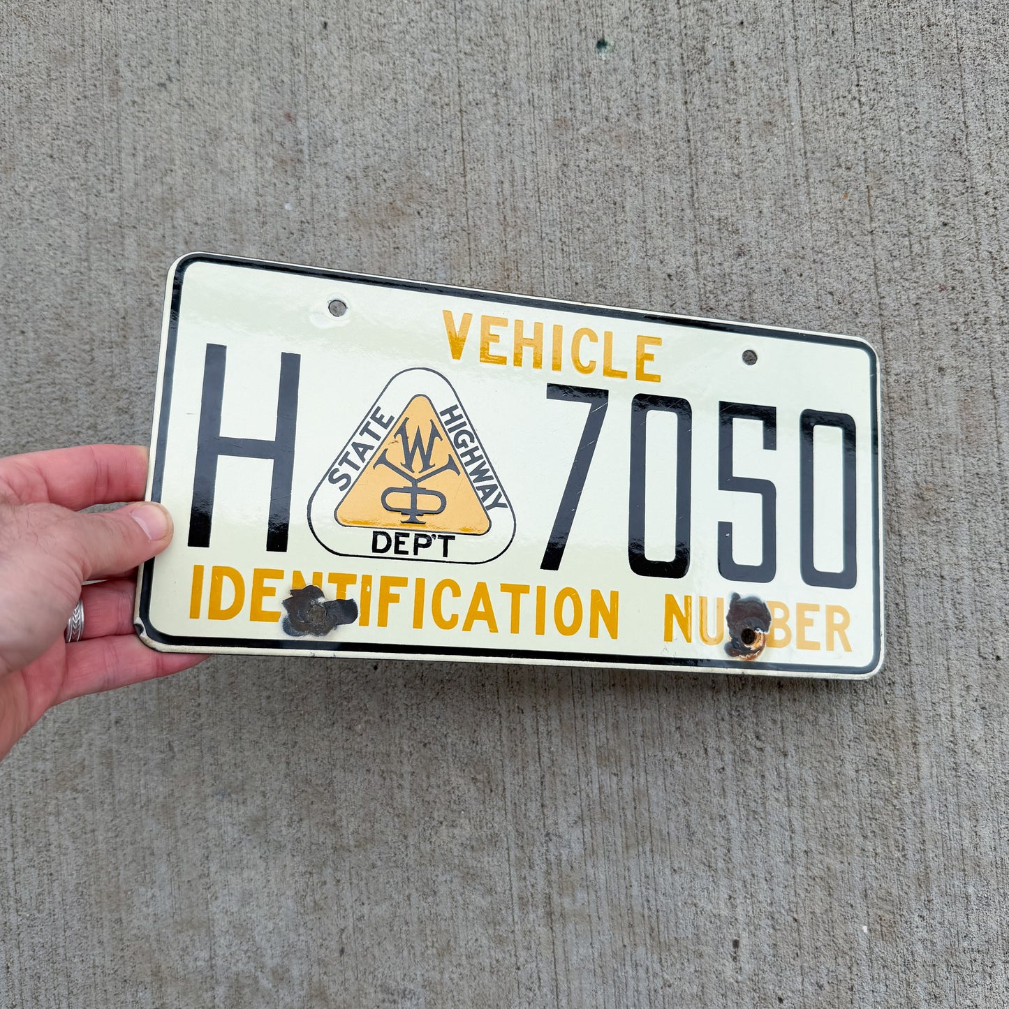 Wyoming Porcelain State Highway Department Booster License Plate Auto Tag H 7050