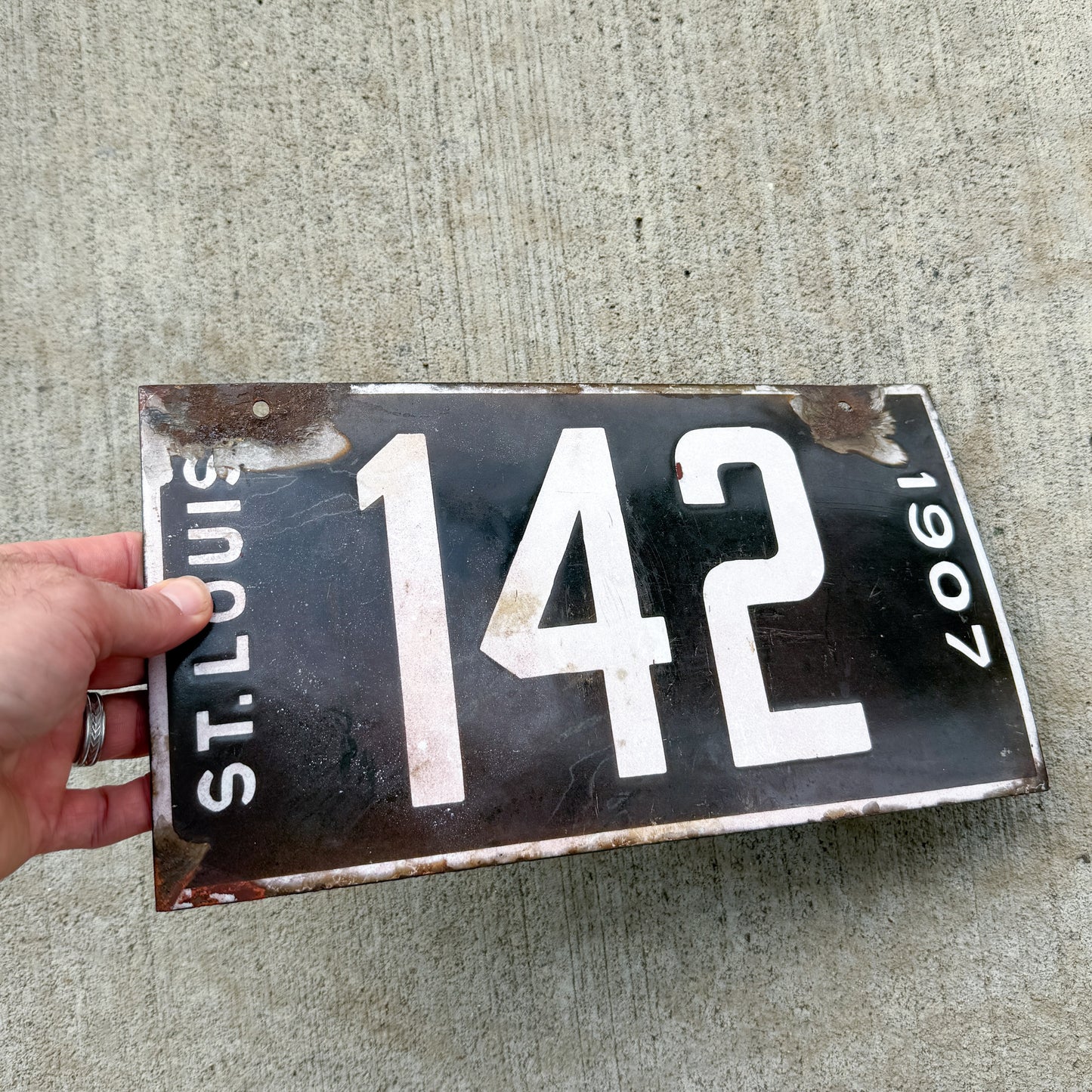 1907 St Louis Missouri Porcelain License Plate Auto Tag Garage Low Number Three Digit 142