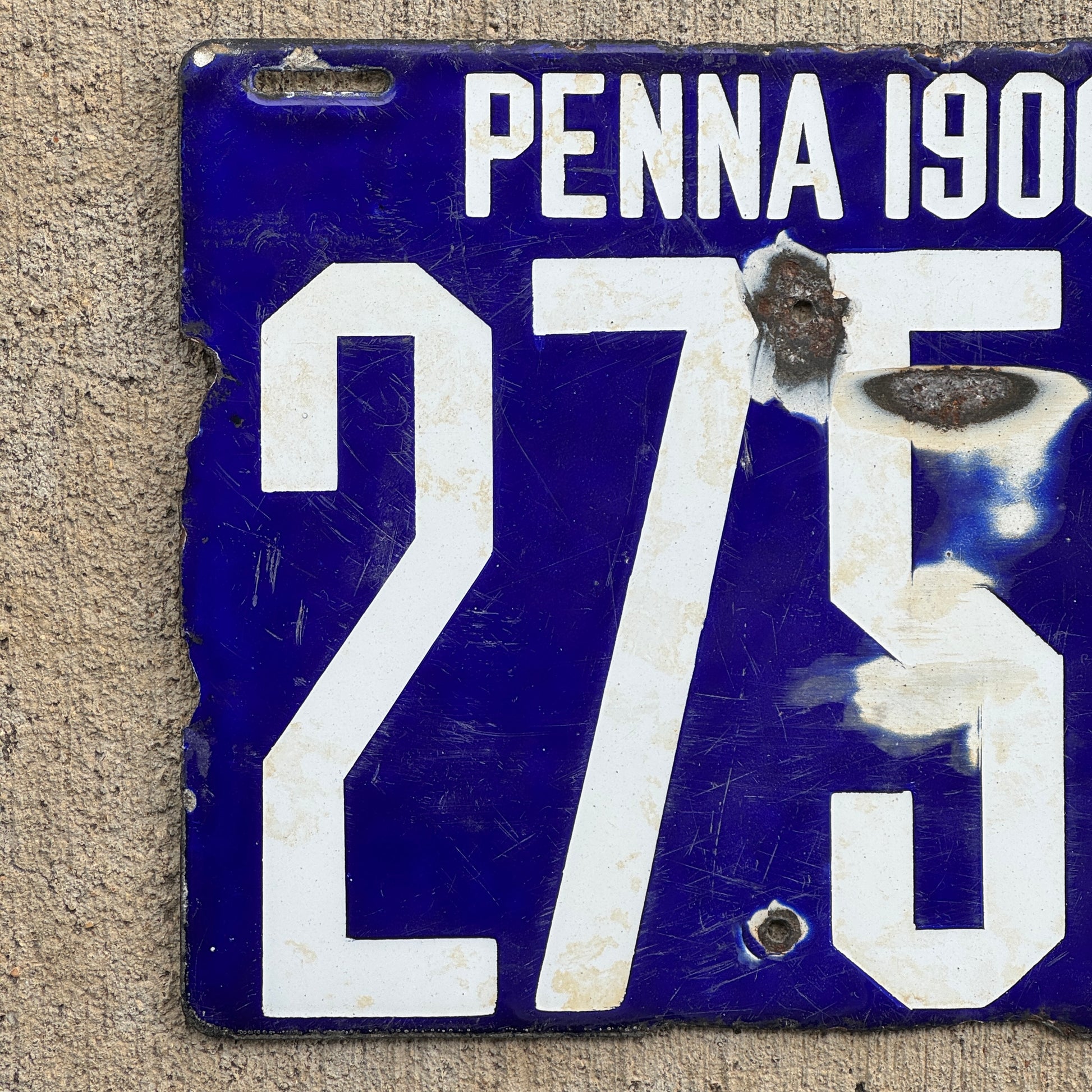 Up close photo of a 1906 Pennsylvania Porcelain License Plate Number 2758