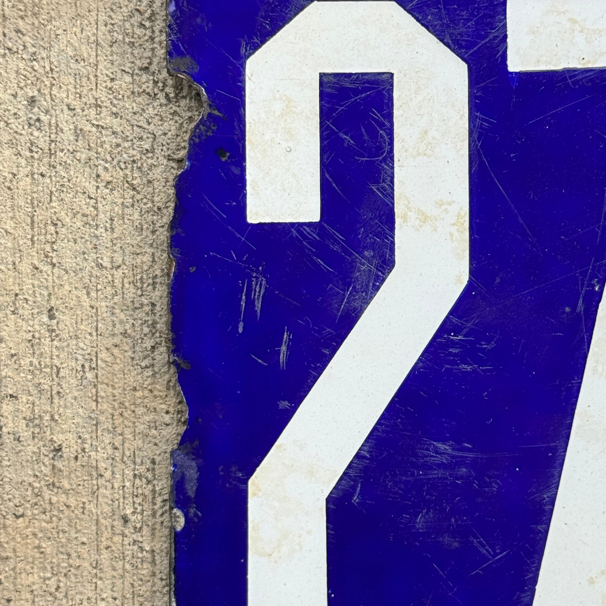 Up close photo of a 1906 Pennsylvania Porcelain License Plate Number 2758