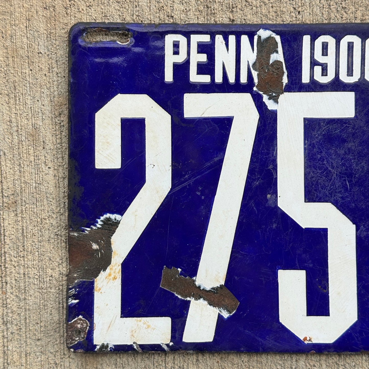 Up close photo of a 1906 Pennsylvania Porcelain License Plate Number 2758