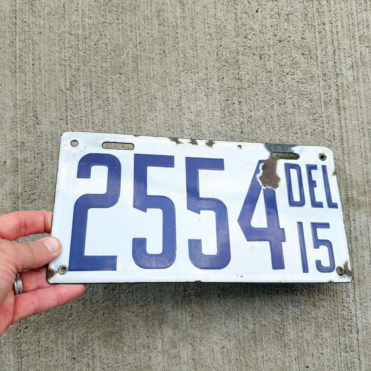 1915 Delaware Porcelain License Plate Auto Tag Low Number Four Digit 2554