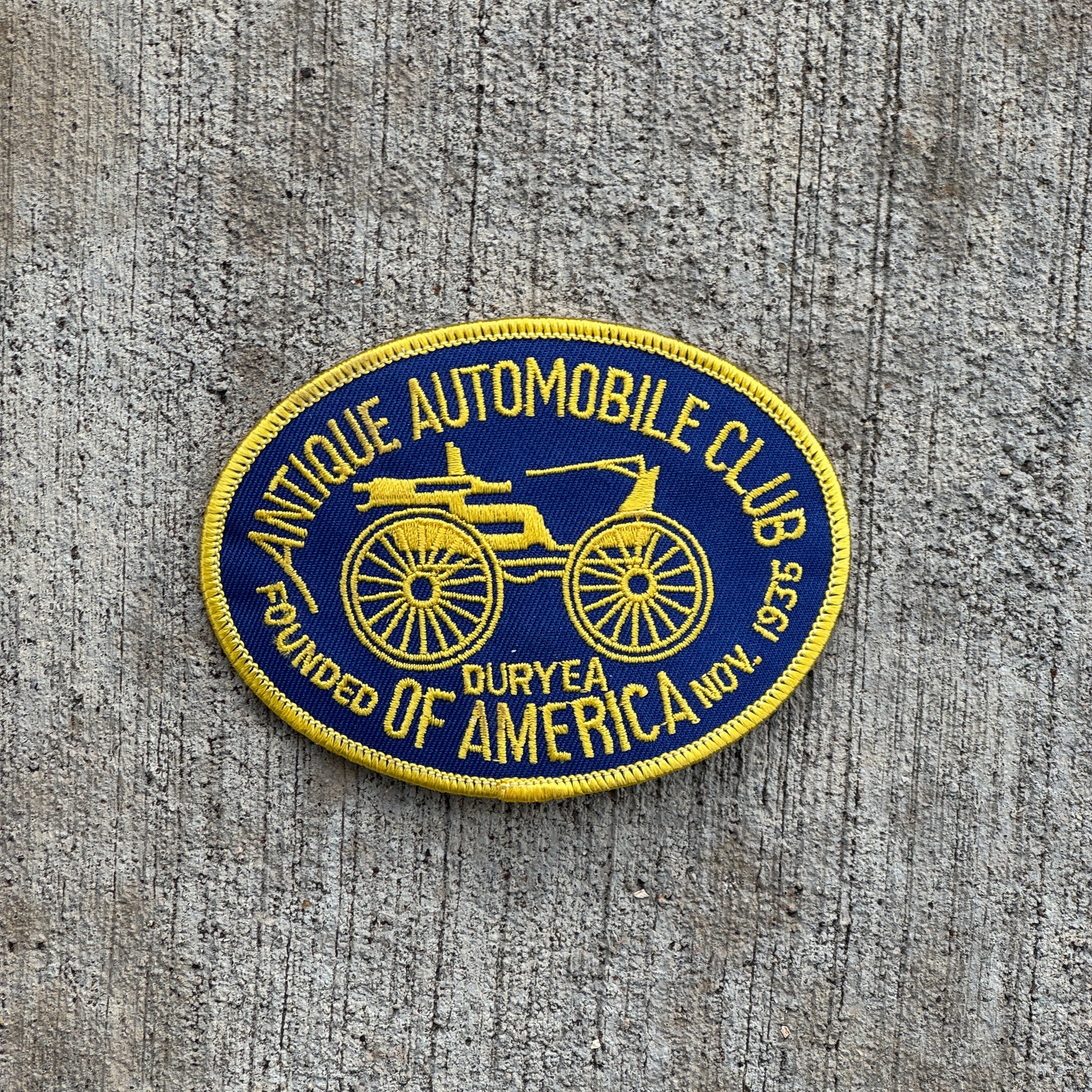 Photo of a Antique Auto Club of America Patch Auto Tag Garage Decor Vintage Embroidered with original patina