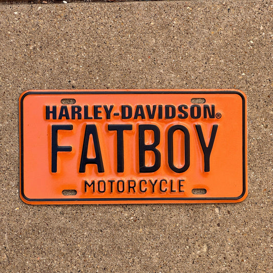 Photo of a Booster License Plate Auto Tag Garage Decor Vintage Metal Harley Davidson Motorcycle FATBOY Full Sized