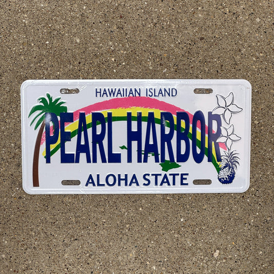 Photo of a Hawaii Booster License Plate Auto Tag Garage Decor Vintage Metal PEARL HARBOR