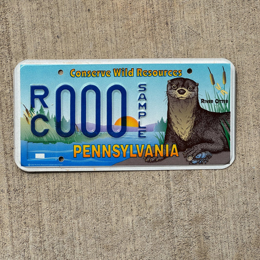 Photo of a Pennsylvania Graphic Sample License Plate Auto Tag Garage Decor Vintage Conservation Wild Otter RC 000