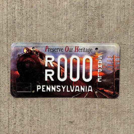 Photo of a Pennsylvania Graphic Sample License Plate Auto Tag Garage Decor Vintage Preserve Our Heritage Train RR 000