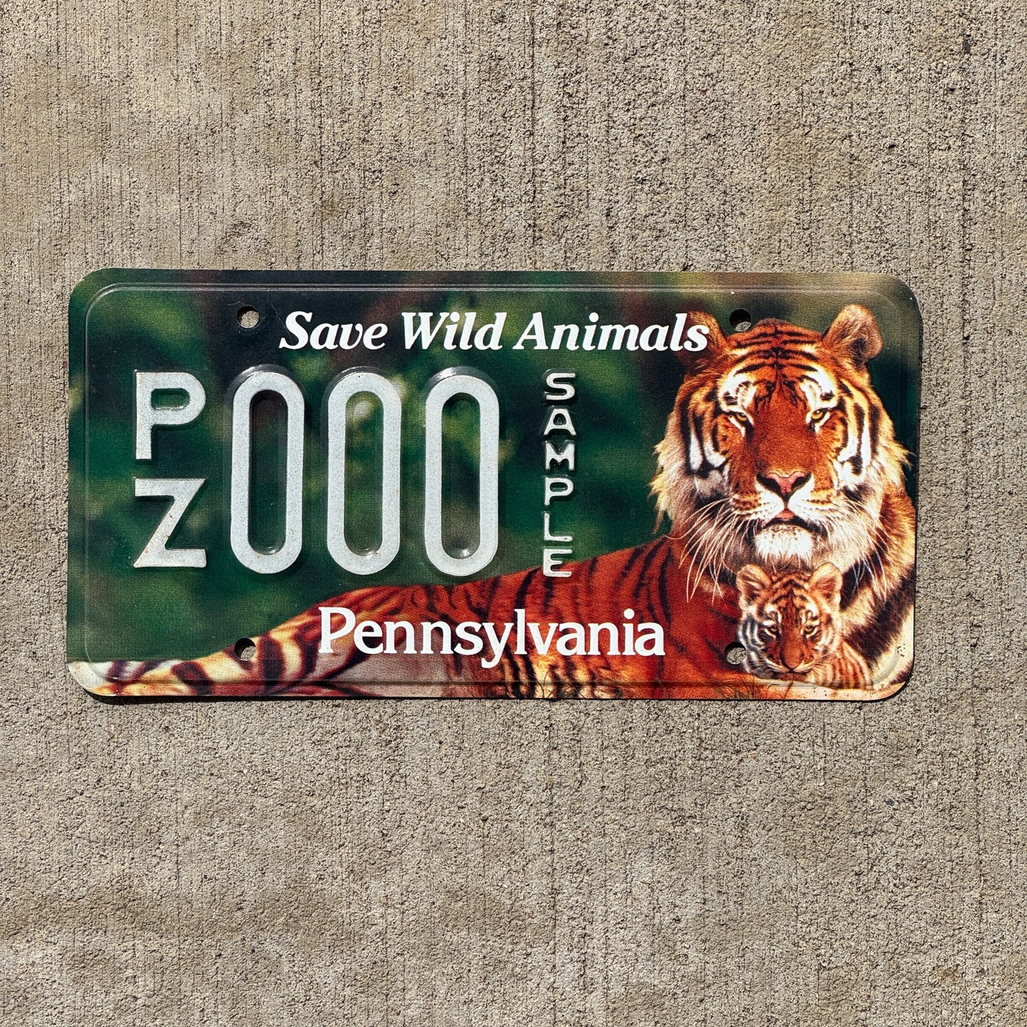 Photo of a Pennsylvania Graphic Sample License Plate Auto Tag Garage Decor Vintage Save Wild Animals Tiger PZ 000
