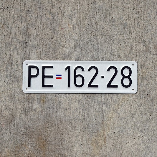 Photo of a Serbia License Plate Auto Tag 1 Vintage PE 162 28 with original patina