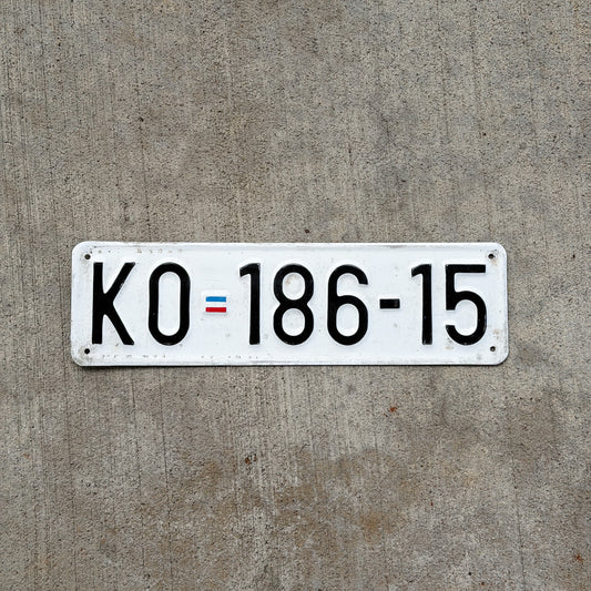 Photo of a Serbia License Plate Auto Tag Garage Decor Vintage KO 186 15 with original patina